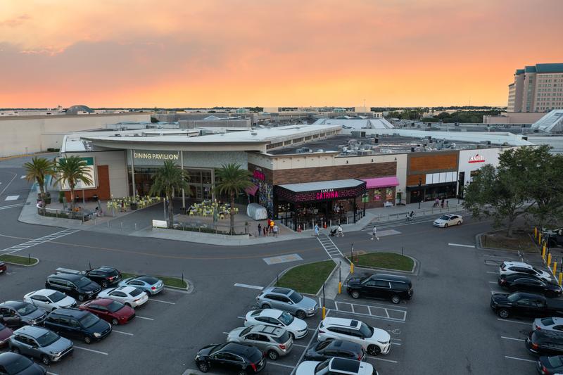 Aerial view of the entrance and parking at sunset — The Florida Mall, Orlando FL