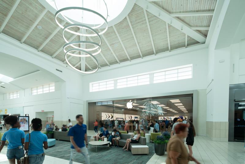Interior center court with skylights and shopper seating — The Florida Mall, Orlando FL