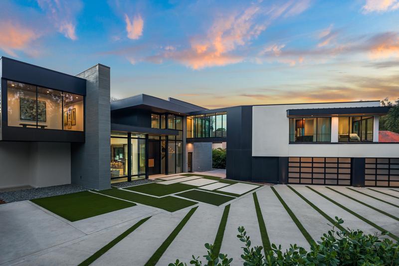Front elevation and motor court at twilight — The New American Home 2026, Orlando FL