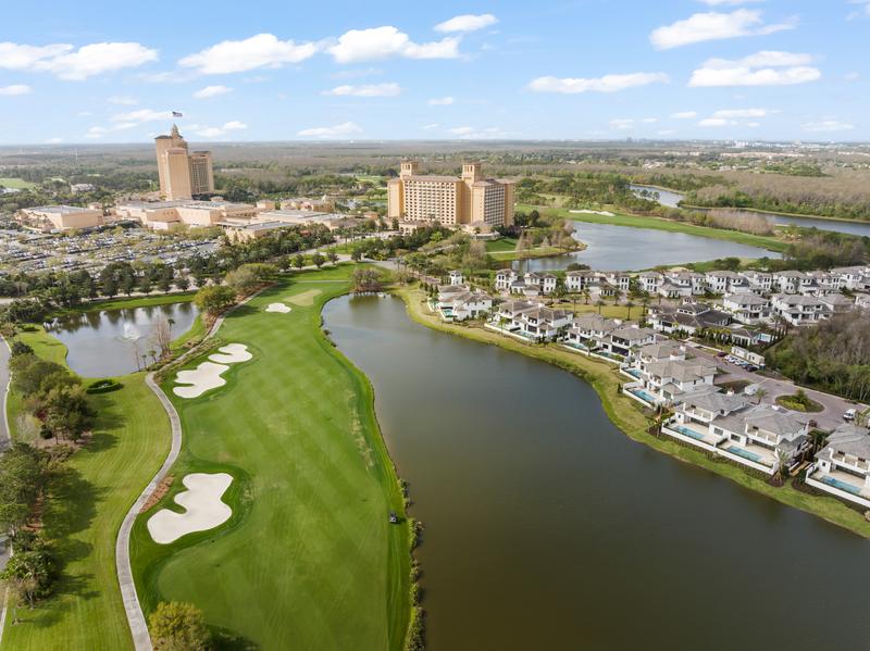 Aerial view of the residences, golf course, and Grande Lakes resort towers — Ritz-Carlton Residences at Grande Lakes, Orlando FL