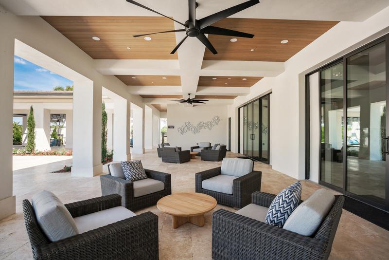 Covered terrace lounge with ceiling fans — Ritz-Carlton Residences at Grande Lakes, Orlando FL